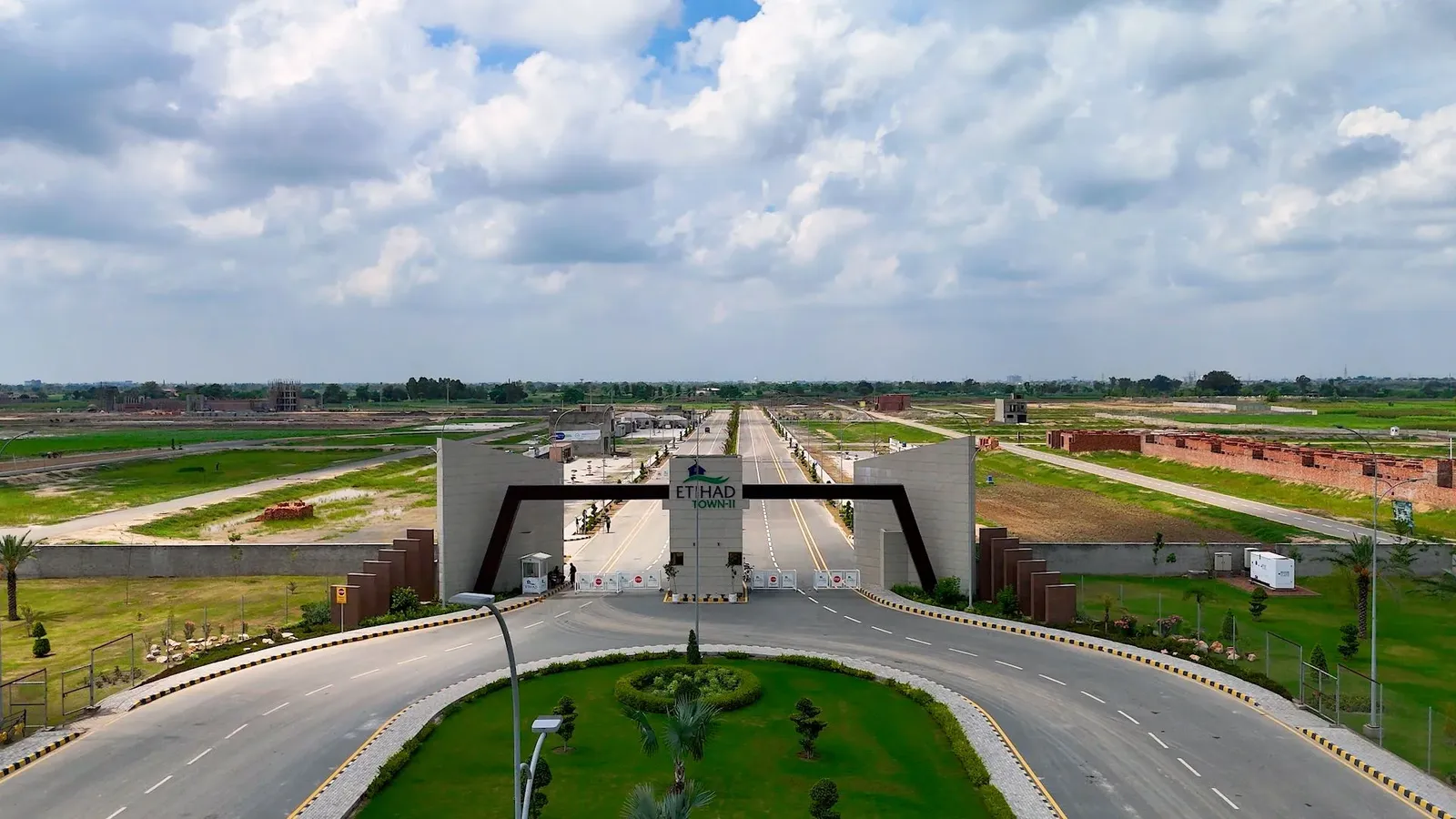 Developed entrance and landscaped roads of Etihad Town Phase II Lahore